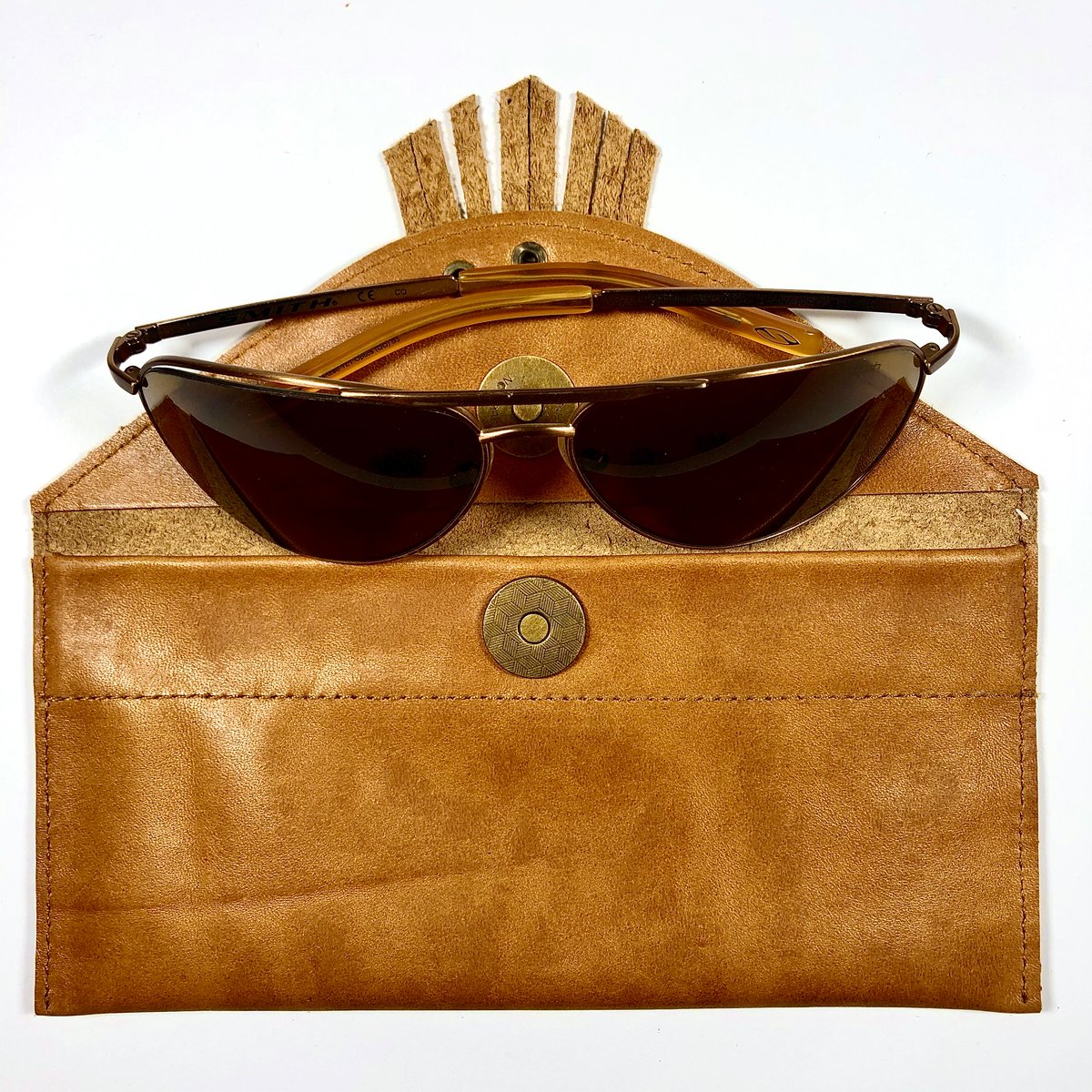 Image of Sunglasses case in tan with fringe