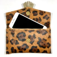 Image 2 of Mini clutch in leopard fur with fringe