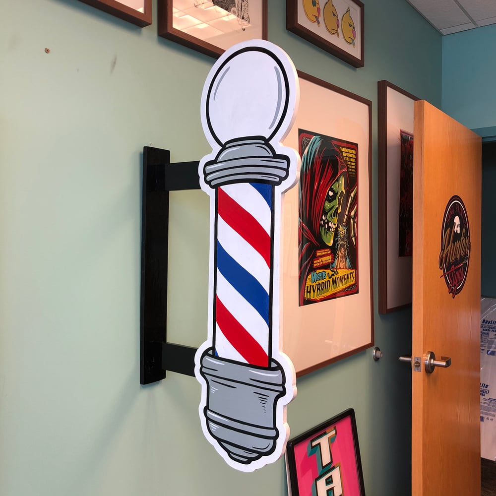 Double sided barber pole blade sign
