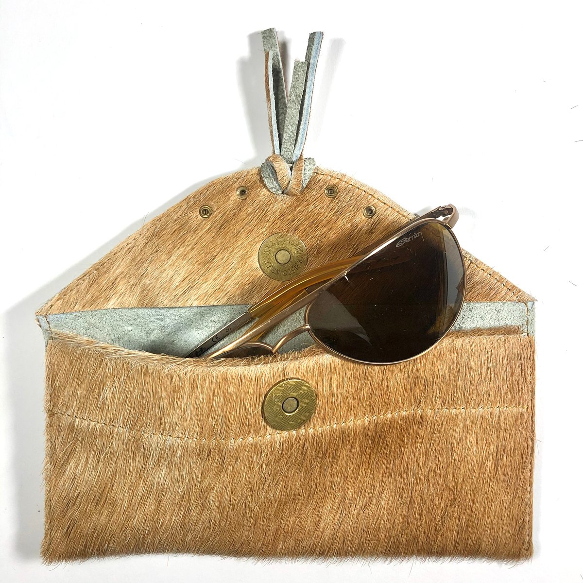 Image of Sunglasses case in tan fur with tassel