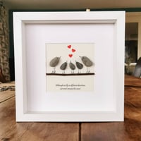 Image 2 of Family of five on branch