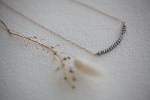 Image of grey freshwater pearl necklace with chain