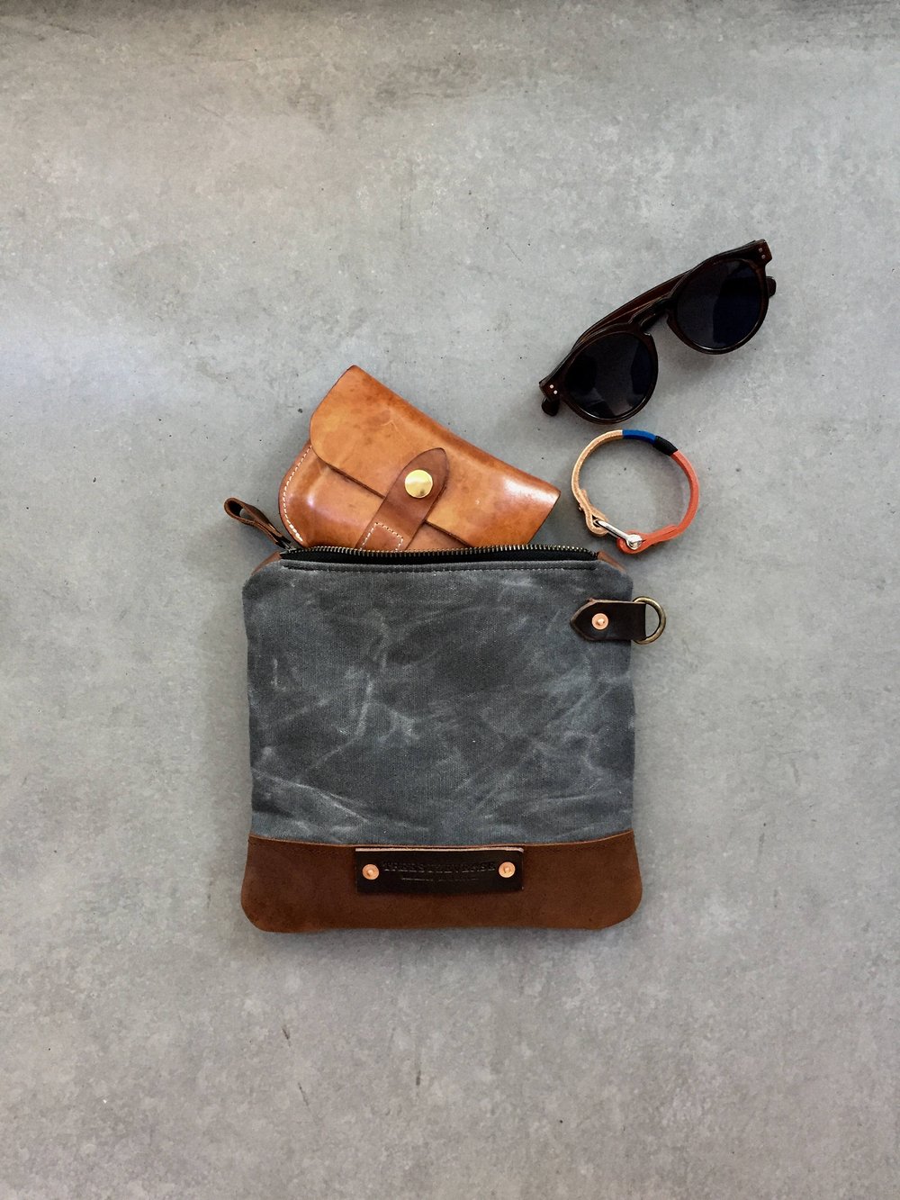 Image of pouch in waxed canvas toiletry bag