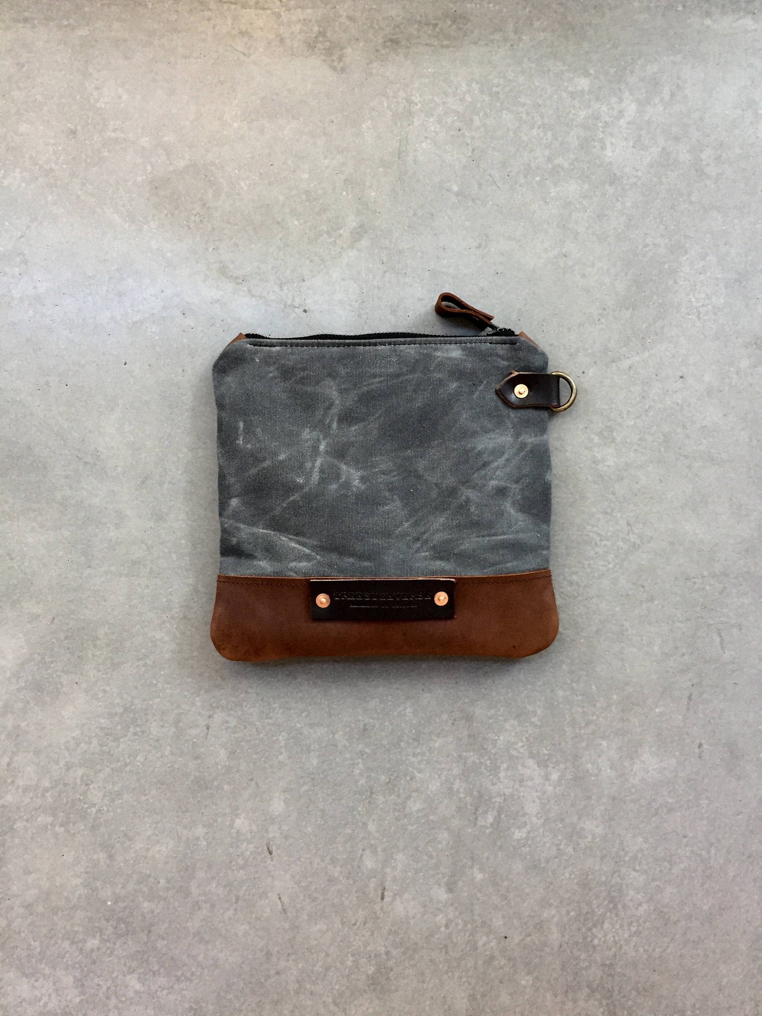 Image of pouch in waxed canvas toiletry bag
