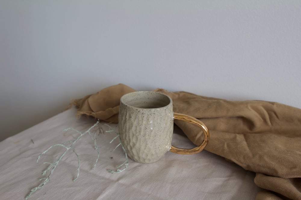 Image of Carved Mugs 