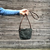 Image 1 of Minimalist day bag in waxed canvas with leather shoulder strap, zipper pouch