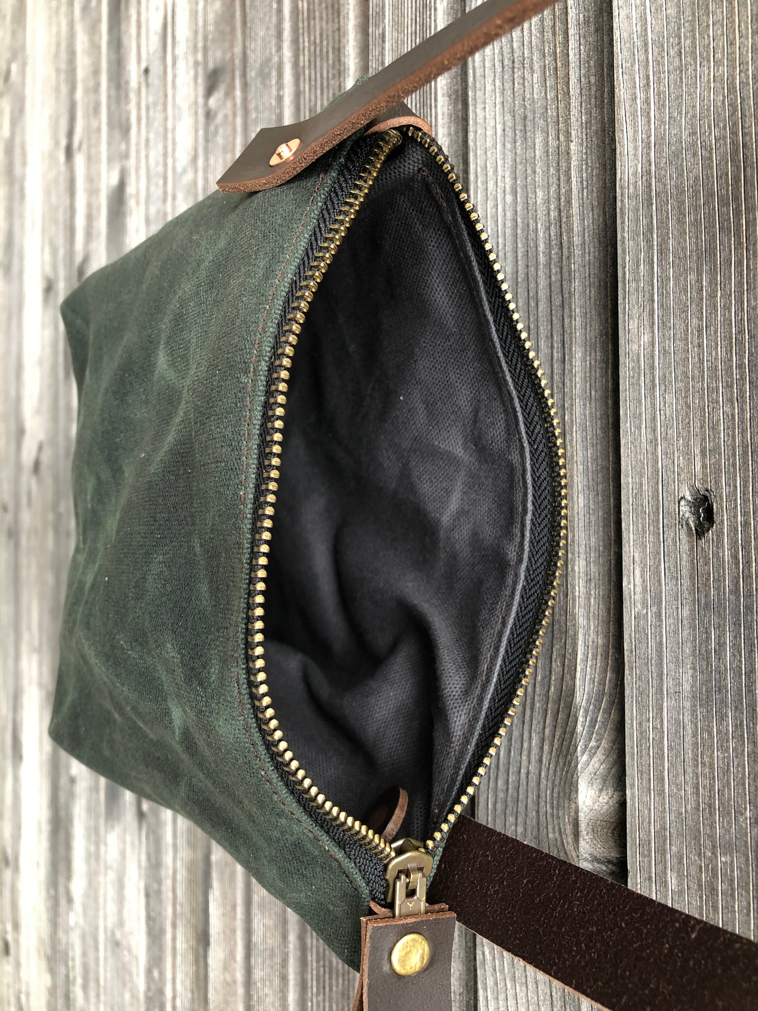Image of Minimalist day bag in waxed canvas with leather shoulder strap, zipper pouch