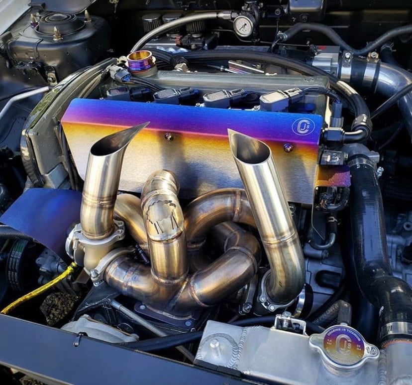 Mitsubishi Evo 8/9 titanium valve cover and cam position heatshield.