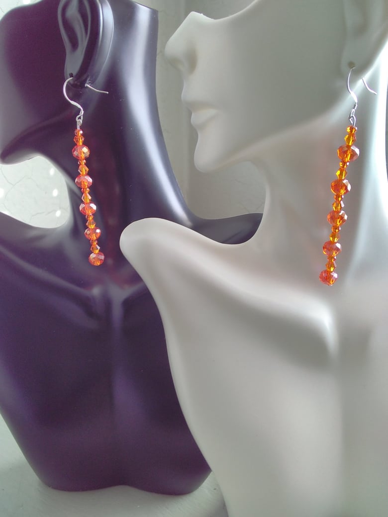 Image of THREE ORANGE BEADED EARRINGS