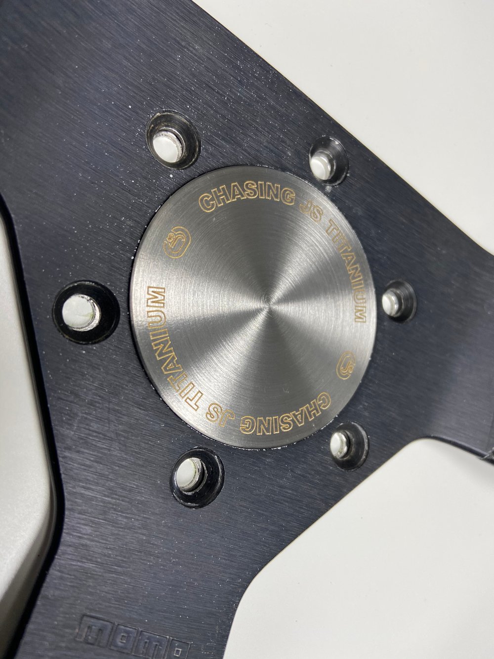 Titanium steering wheel horn delete