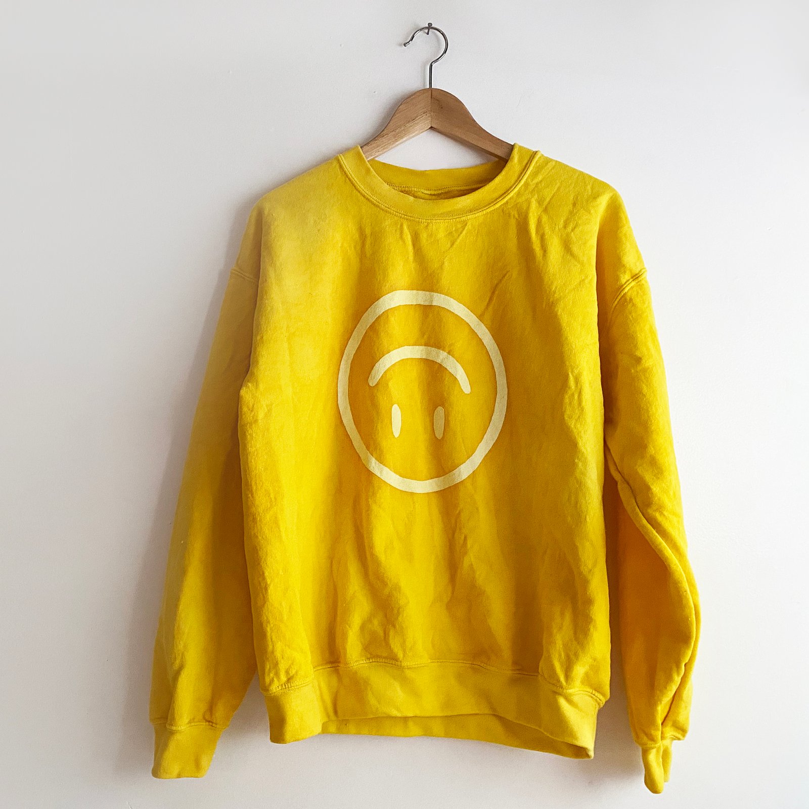 yellow happy sweatshirt