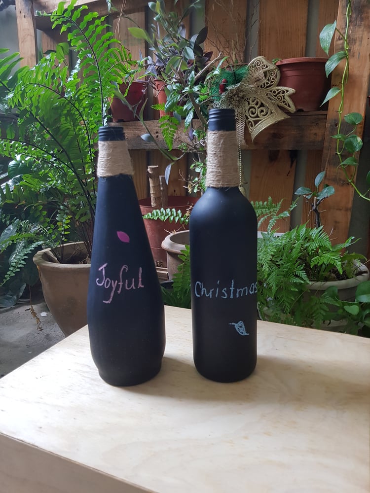 A set of 2 medium size chalkboard bottles for Christmas messages 