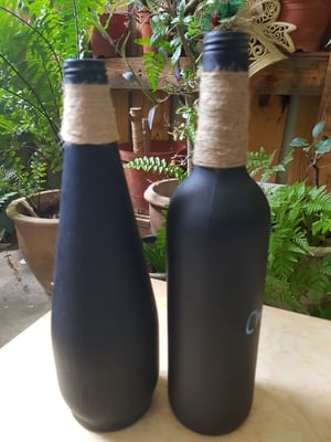 A set of 2 medium size chalkboard bottles for Christmas messages 