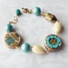 Florentine Bracelet – Blue Flower + Gold Urn Coins