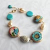 Florentine Bracelet – Blue Flower + Flourish Coins