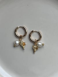Image 1 of 18k Gold Seashell Huggies