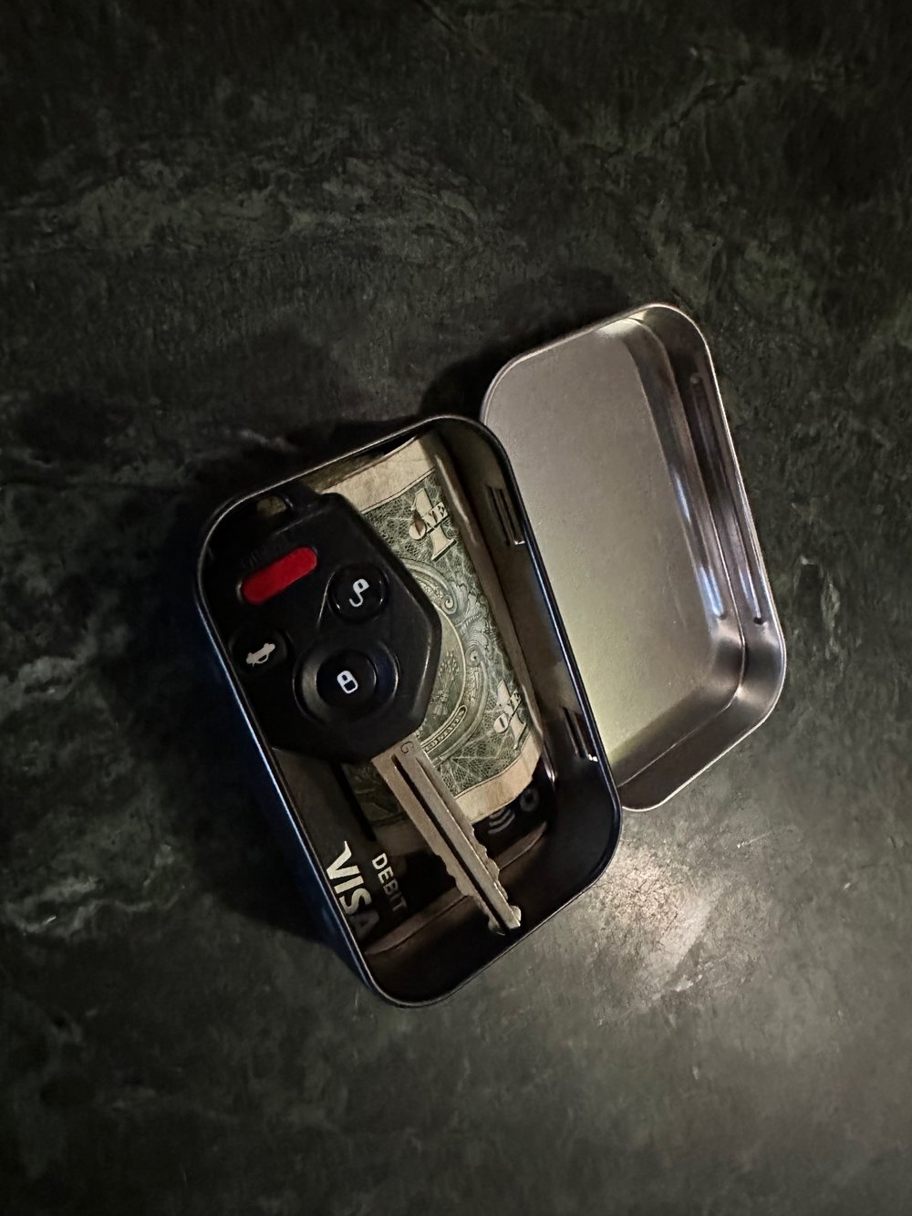 The Hidden Loom stash/EDC tin