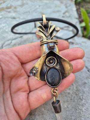 Bullet casings, pebbles and crystal necklace 