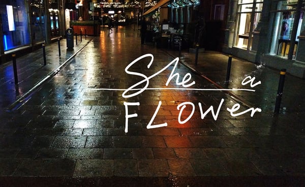 Image of She. A Flower