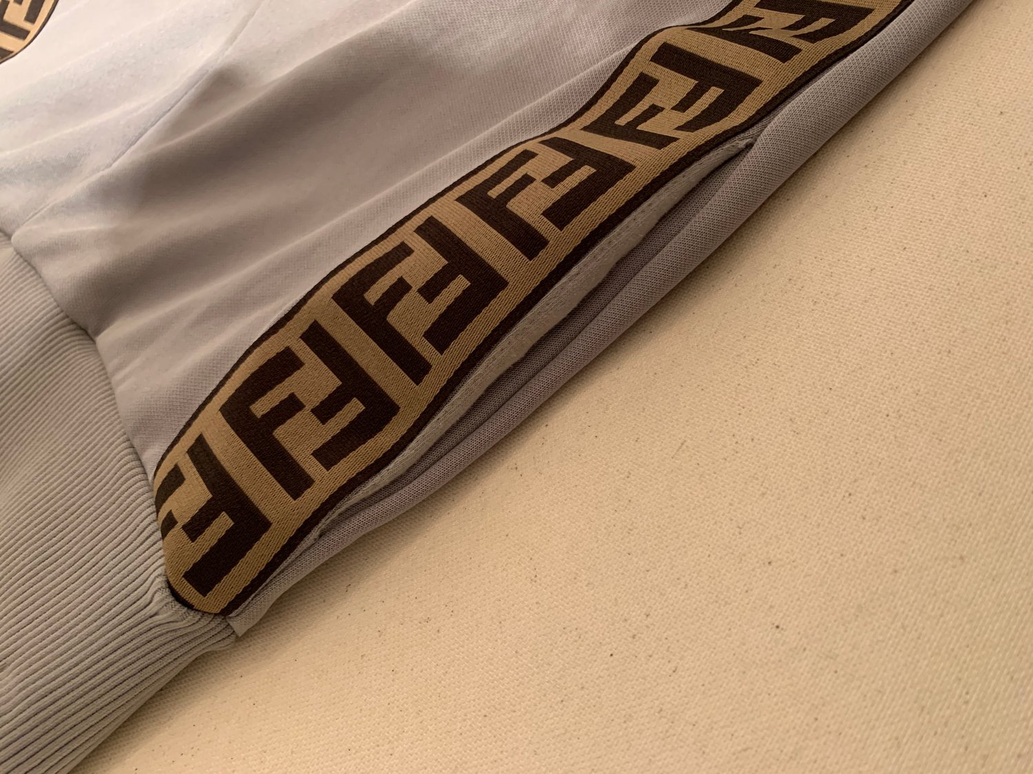 Image of FENDI MONOGRAM TRACK PANTS