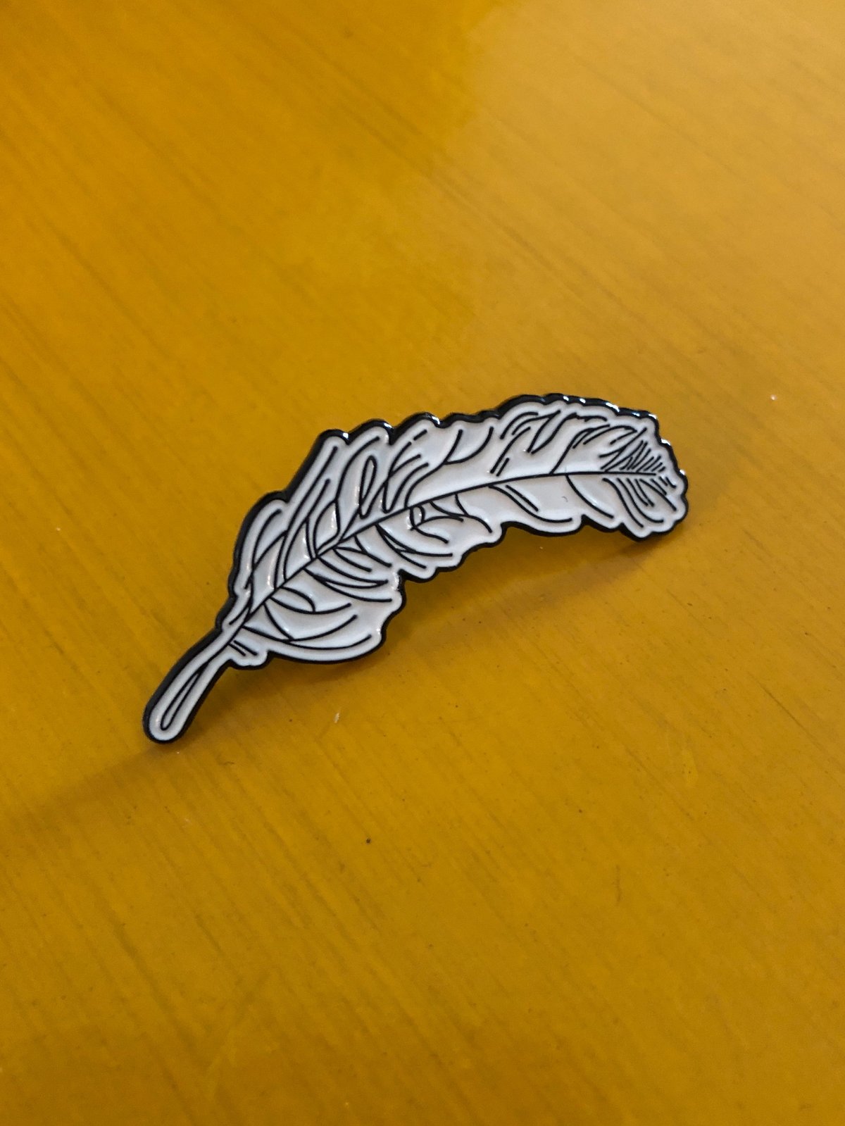 Image of Feather Logo Pin
