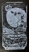 “Get Yourself Together” linocut on black paper