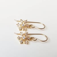 Image 3 of Simple Golden Snowflake Earrings