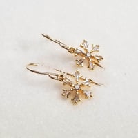 Image 4 of Simple Golden Snowflake Earrings