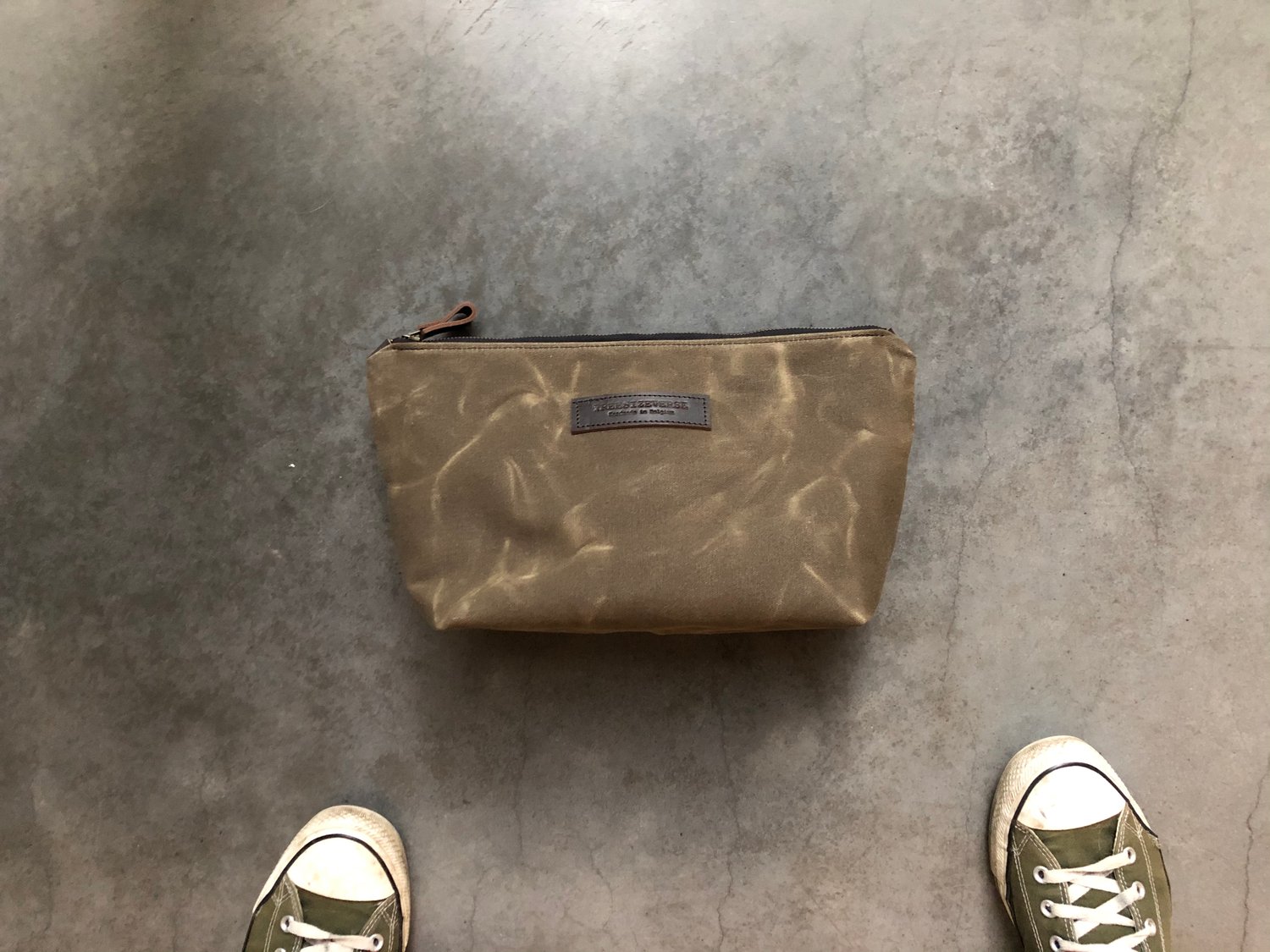Image of Waxed canvas toiletry bag with luggage handle attachment 
