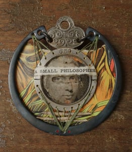 Image of Brooch: A SMALL PHILOSOPHER.