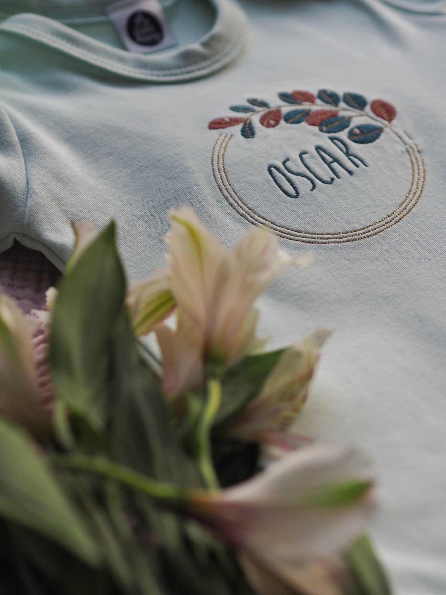 Image of Autumn Dew - mint baby grow 