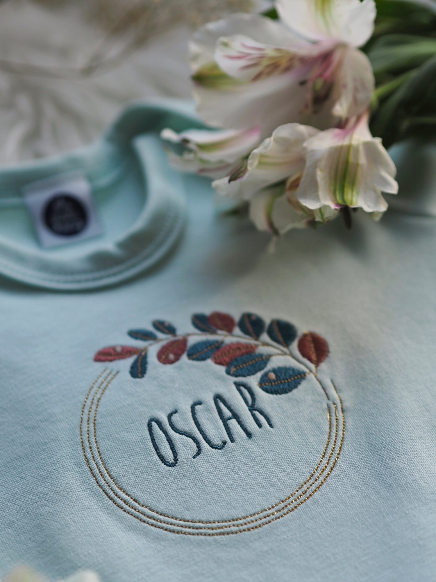 Image of Autumn Dew - mint baby grow 