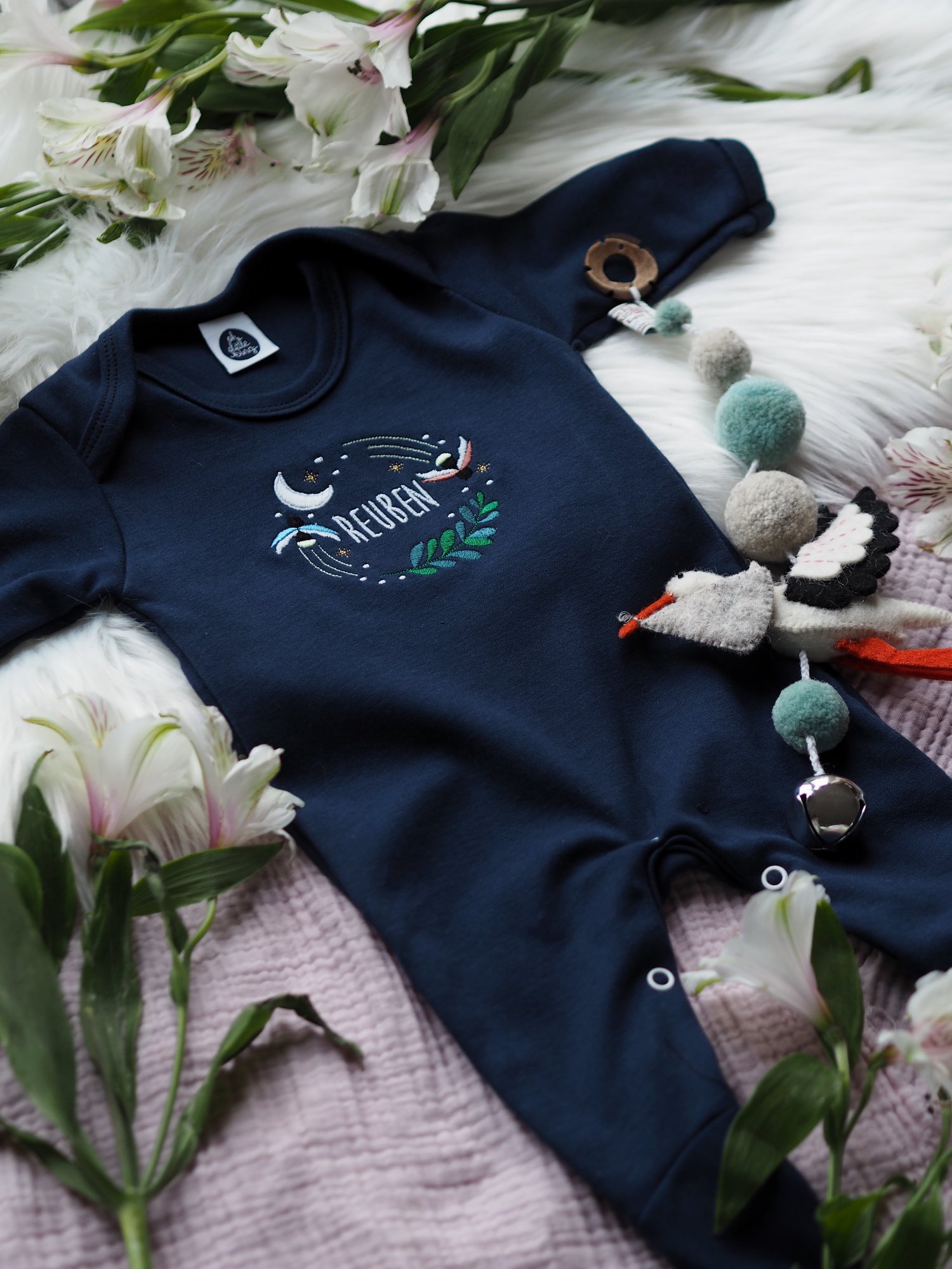 Image of  Fireflies Who Glow In The Dark - Navy baby grow