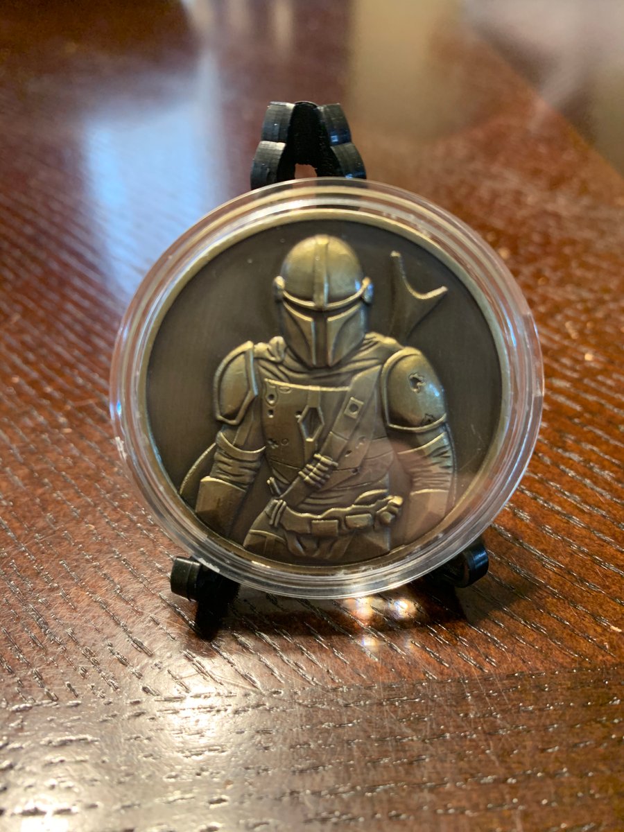 the mandalorian silver coin