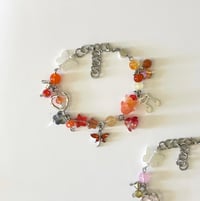 Image 2 of Kali Uchis Red Moon In Venus + Sincerely, Bracelets