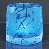Image 1 of Blue tealight holder with twigs and stars design
