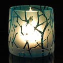 Blue tealight holder with twigs and stars design