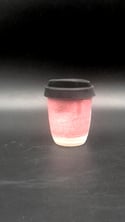 Reusable pink espresso cup.