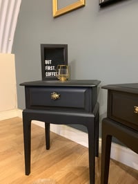 Image 2 of A pair of black stag side tables 