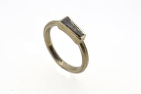Image 2 of 18ct white gold ring set with a tapered baguette cut diamond 