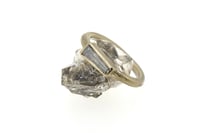 Image 1 of 18ct white gold ring set with a tapered baguette cut diamond 