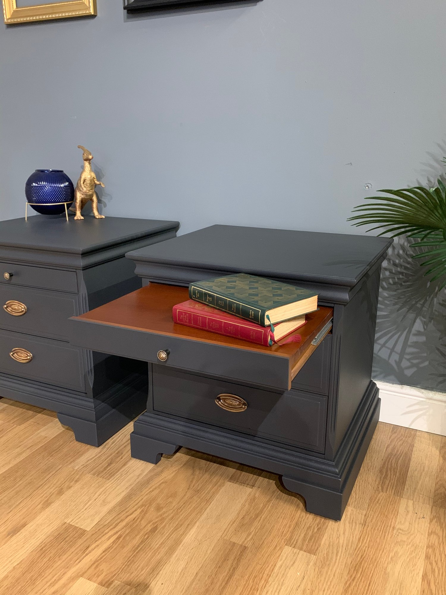 Image of A pair of mahogany Stag bedside tables in dark grey.