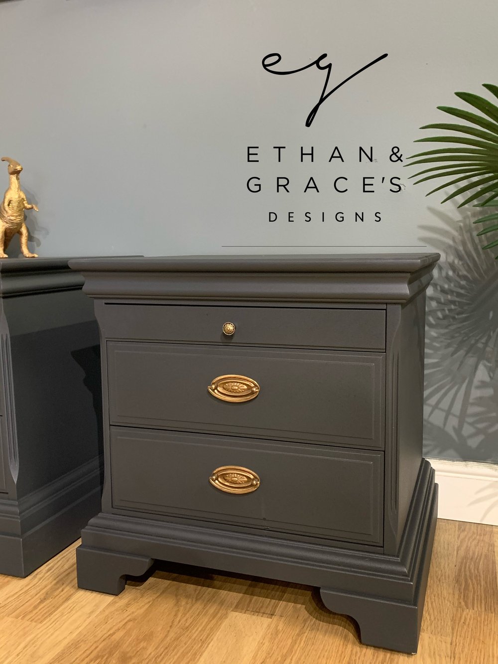 Image of A pair of mahogany Stag bedside tables in dark grey.