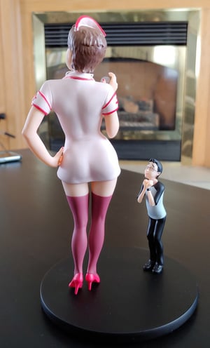 Image of Peggy with mini Gary figurine