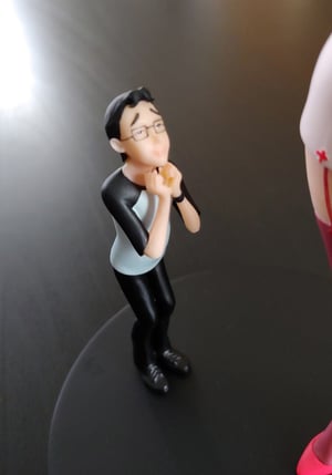 Image of Peggy with mini Gary figurine