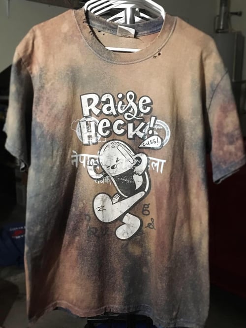 Image of Raise Heck Tee "Nepalese Society" - Large