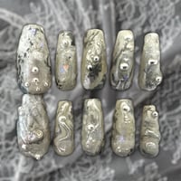 Image 1 of Scale Clawz