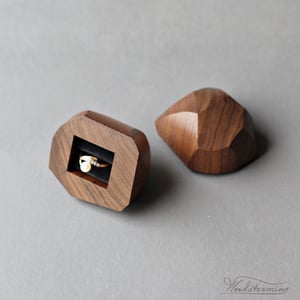 Image of Wavy faceted walnut ring box 