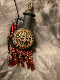 Image 3 of Maroon ,black and copper bottle with fringe and copper accents.