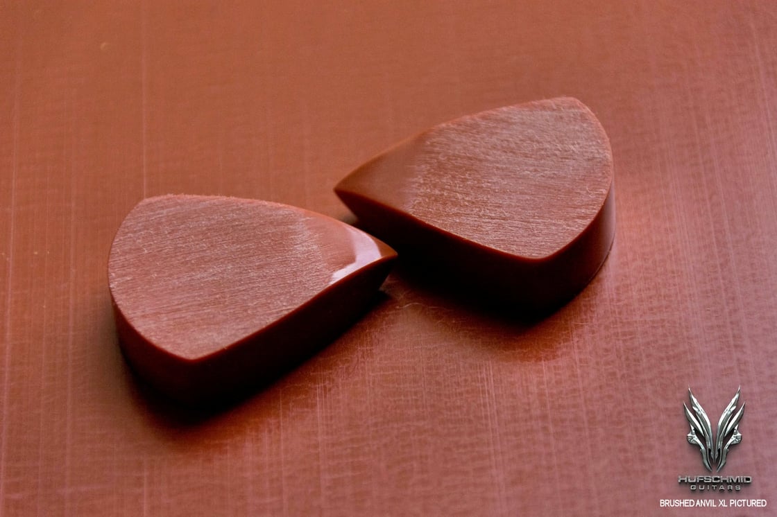 Image of The original 'RED HUFTRON' plectrum